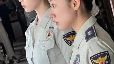 MV 신작에서 여경 제복 입은 아이유...은근히 므흣한 몸매 라인